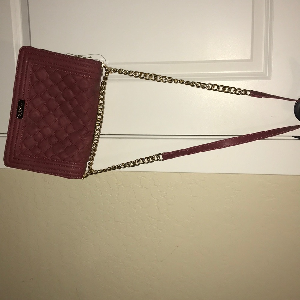 Bebe pink side purse. Never used!